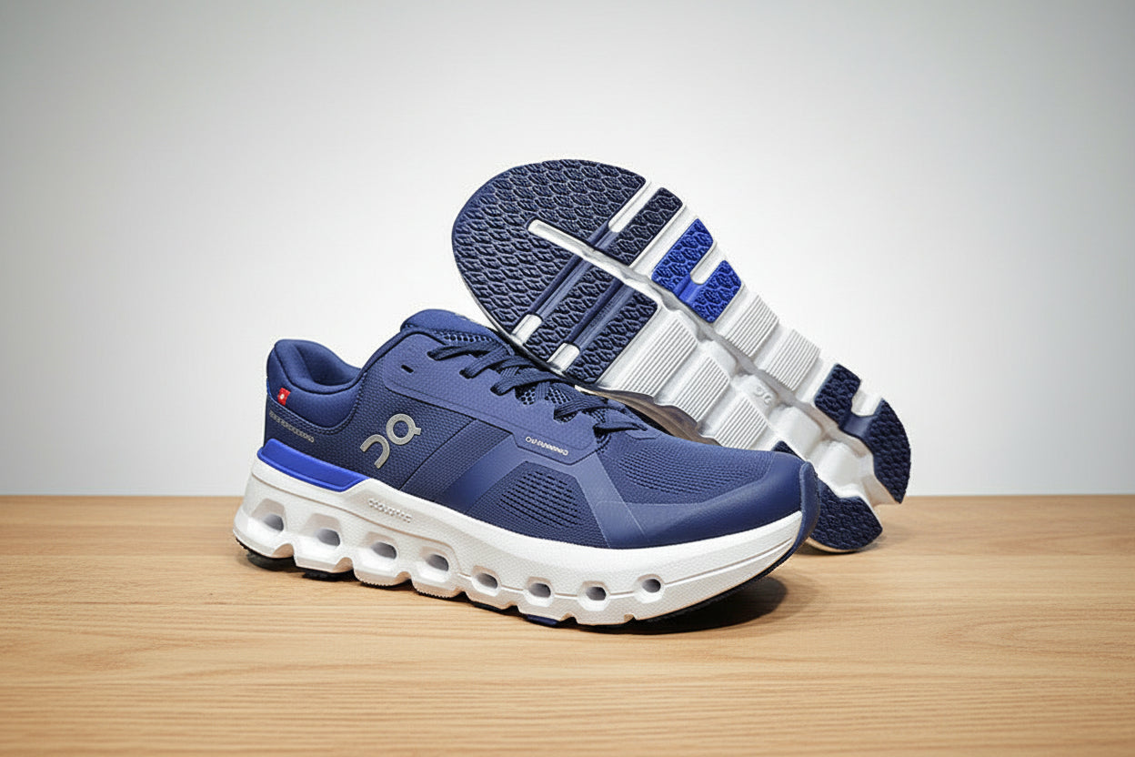 Blue and white running shoes on a light gray surface with a black background